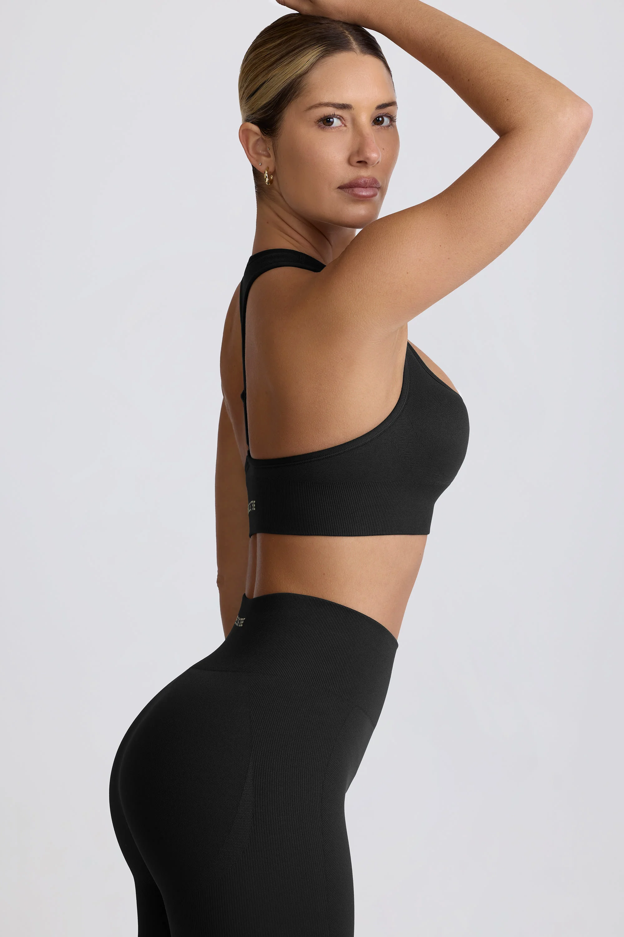Super Sculpt Seamless T-Back Sports Bra in Black - Image 4